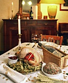 Chicken on lime blossom with stuffing on festive table