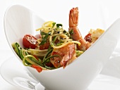 Spaghetti with prawns, courgettes and tomatoes