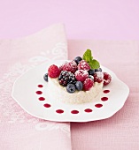 Creamed rice pudding with fresh forest fruits