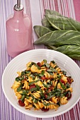 Pasta spirals with Swiss chard and sausage