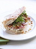 Marinated goat's cheese, fried pear, Parma ham & watercress in ciabatta