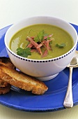 Pea soup with ham and parsley
