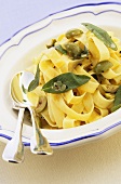 Ribbon pasta with olives and sage