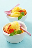 Peach sorbet with mint leaves