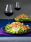 Grilled salmon steaks on a fennel salad