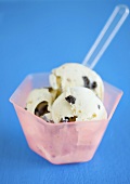 Three scoops of ice cream in sundae dish