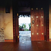 View of terrace through open wooden door