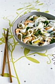 Chicken soup with prawns, peanuts and Asian ribbon noodles