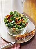 Lamb's lettuce salad with bacon and nuts