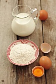 Ingredients for pancakes: flour, eggs and milk