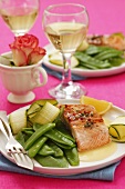 Salmon with Hollandaise sauce, mange tout and courgette