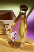 A bottle of sake with a label