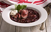 Red cabbage soup with beef and horseradish sauce