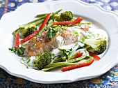 Salmon in coconut suace with broccoli, beans and pepper