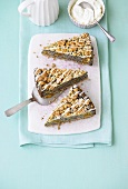 Three mandarins and poppy seed slices with crumbles