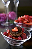 Baked chocolate pudding with fresh berries