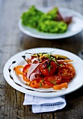 Tomato salad with ham and herbs