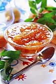 Apricot jelly in small glass dish