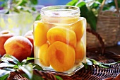 Peach compote in screw-top jar