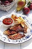 Barbecued pork chops with tomato sauce