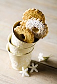 Canestrelli biscuits in stacked beakers