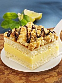 Piece of crumble cake with lemon cream filling