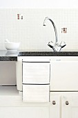 DIY - splashback of mosaic tiles with patterns of squares in contrasting colours