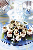 Soft cheese and grapes on cocktail sticks