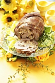 Rolled veal roast with green salad for Easter