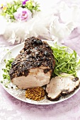 Roast pork with herb crust and mustard for Easter