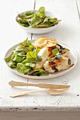 Barbecued chicken breast fillet with pear and baby leaf salad