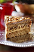 Piece of toffee cake with hazelnuts for Christmas