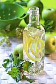 Home-made apple vinegar in bottle