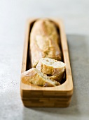 Baguette in wooden holder