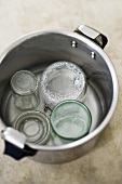 Sterilising jars in a pan