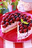 Raspberry cream cake with meringue crumbs