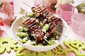 Pork kebabs with broad beans and sheep's cheese