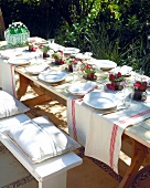 Table laid for special occasion out of doors