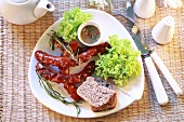 Marinated sausages with honey and mustard sauce