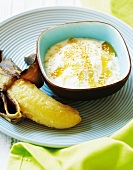 Banana grilled in its skin and Greek honey yoghurt with sesame seeds