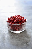 Frozen cranberries in glass dish