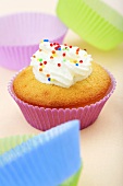 Cupcake with cream and sprinkles