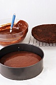 Making chocolate mousse cake (cake mixture in springform pan)