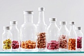 Assorted tablets in bottles
