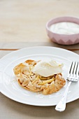 Apple tart with filo pastry crust, almonds and cream