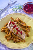 Pork fillet with chanterelles, cranberries and rosemary