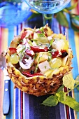 Fruit salad in hollowed-out pineapple