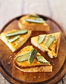 Cheddar cheese on toast with gherkins
