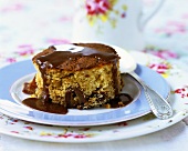 Small round cake with toffee sauce