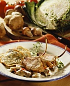Suckling pig chops with ceps and savoy pancakes